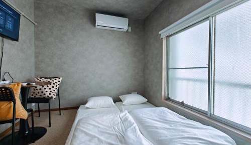 Double or Twin Room with Shared Bathroom
