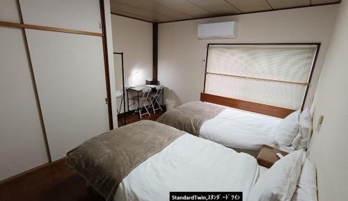Standard Twin Room with Shared Bathroom