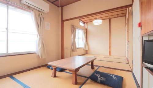 Quadruple Room with Shared Bathroom