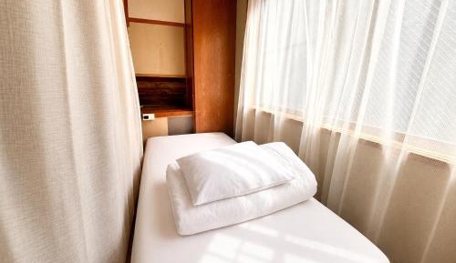 Single Bed in Female Dormitory Room