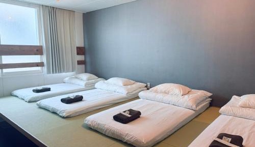 Quadruple Room with Shared Bathroom