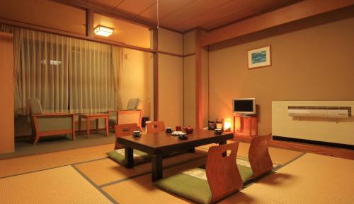 Quadruple Room with Shared Bathroom