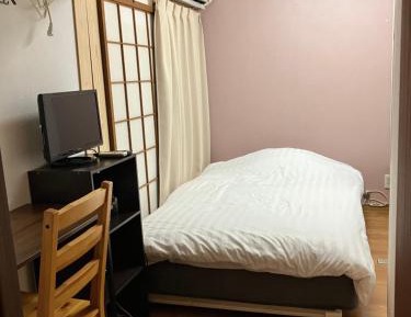 Single Room with Shared Shower and Toilet