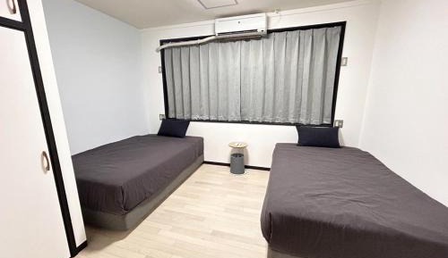 Twin Room with Shared Toilet