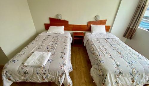 Twin Room with Private Bathroom
