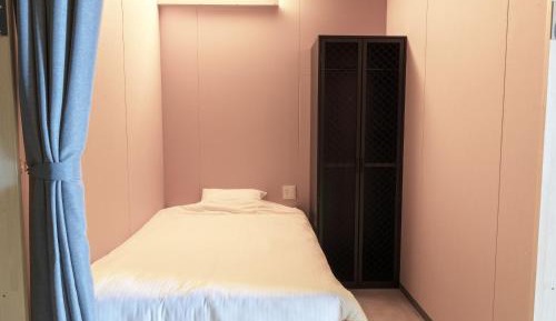 Single Bed in Female Dormitory Room