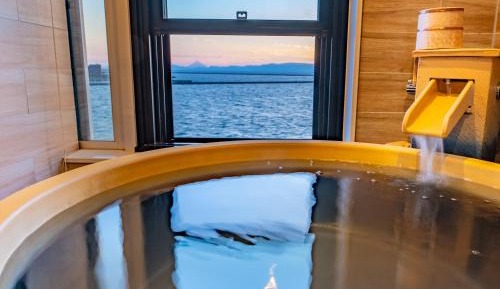 Modern Twin Room with Tatami Area and Semi Open-Air Bath