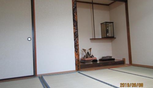 Japanese-Style Family Room with Shared Bathroom