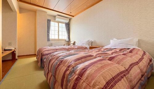 Twin Room with Private Bathroom