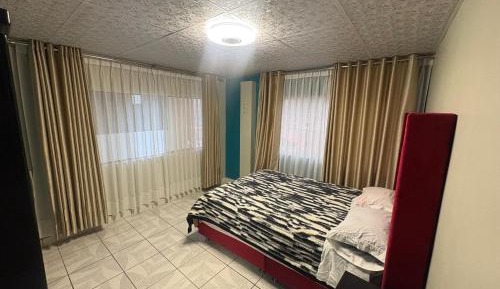 Three-Bedroom Deluxe Apartment