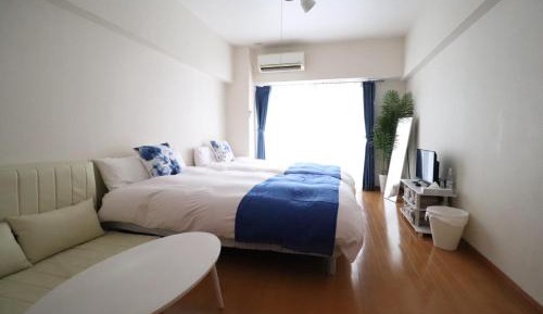 One-Bedroom Apartment with Balcony and City View