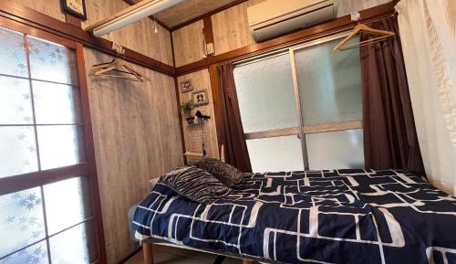 Single Bed in Dormitory Room