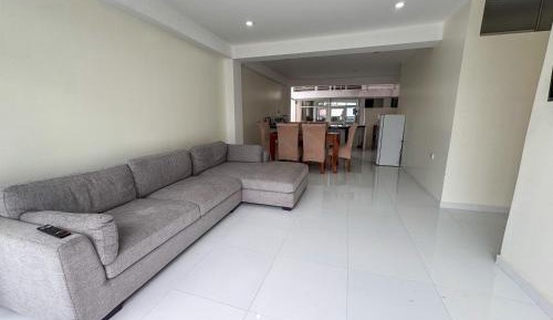 Four-Bedroom Apartment with Balcony 