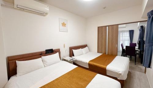 Deluxe Room with Kitchen (2 Double Beds and 1 Sofa Bed) - Non-Smoking