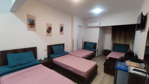 Quadruple Room with Private Bathroom