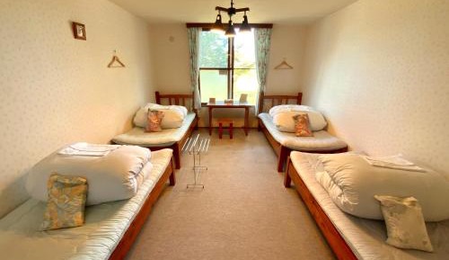 Quadruple Room with Shared Bathroom