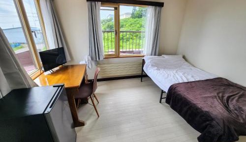Single Room with Shared Shower and Toilet