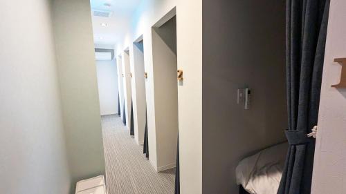 Single Bed in Mixed Dormitory Room