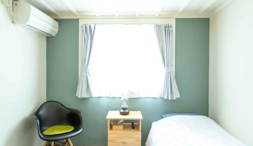 Single Room with Shared Shower and Toilet