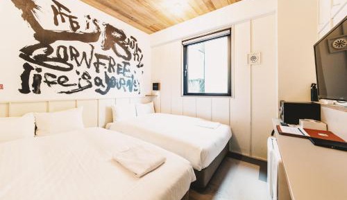 Compact Quadruple Room - 2 Small Double Beds