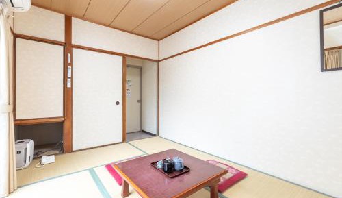 Triple Room with Shared Bathroom