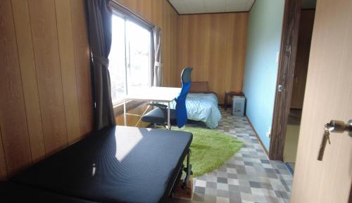 Single Bed in Female Dormitory Room