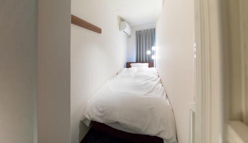 Single Bed in Female Dormitory Room