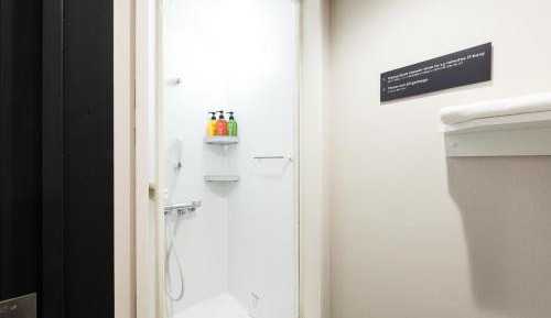 2 Single Beds with TV in 12 Beds Mixed Dormitory Room