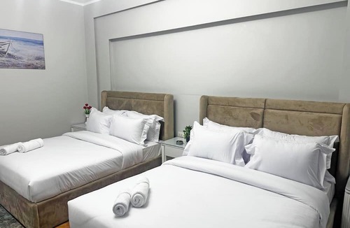 Qasr an-Nil Apartment | Two-bedroom apartment in Qasr El Nil district overlooking the Nile River