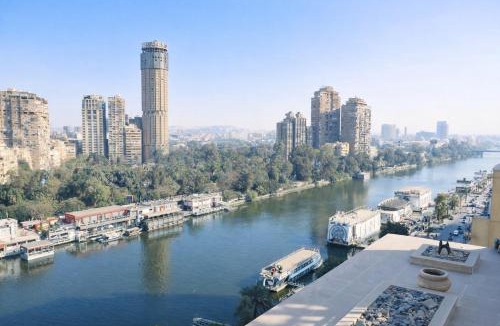 Al Duqqi Apartment | Nilefront 3BDR Apartment with Panoramic Views l Agouza