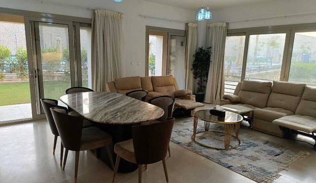 Carrara White 3BR APT Garden and Pool